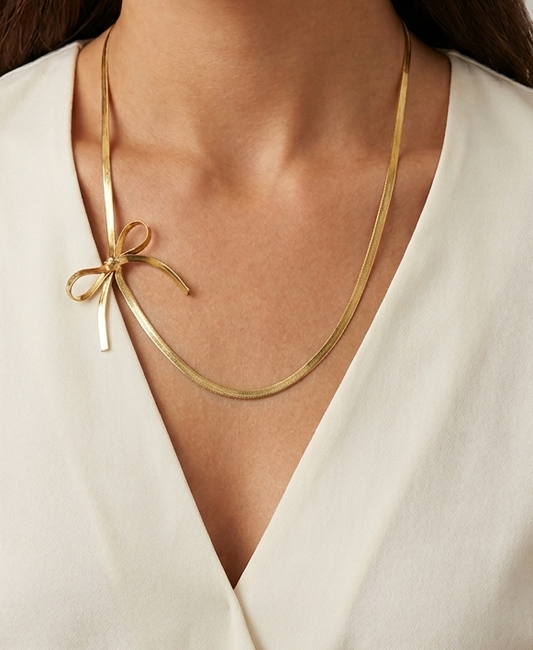 side bow golden necklace