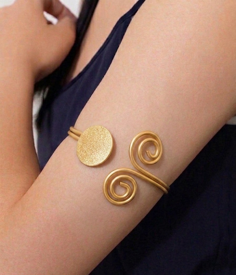 modern disc and coil cuff
