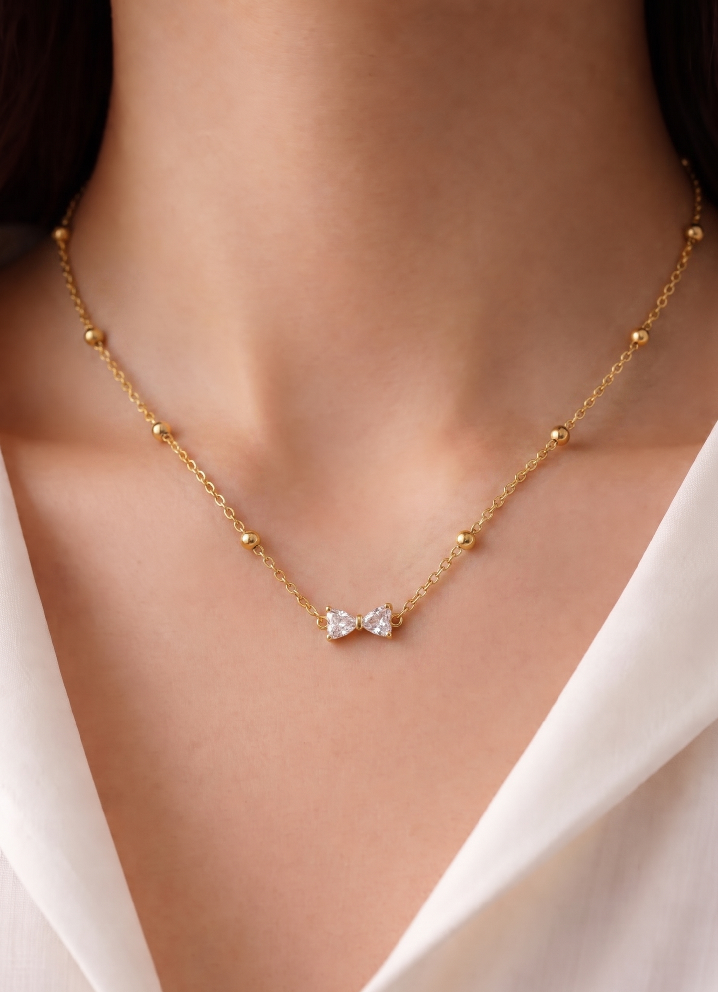 zerconia bow tie beads chain necklace