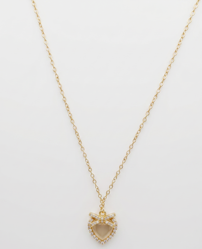 gilded bow shimmering heart pendant necklace