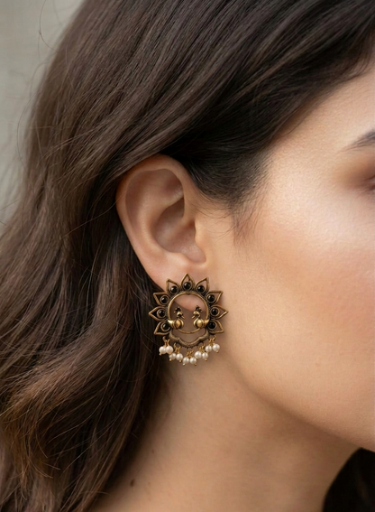 the royal peacock studs