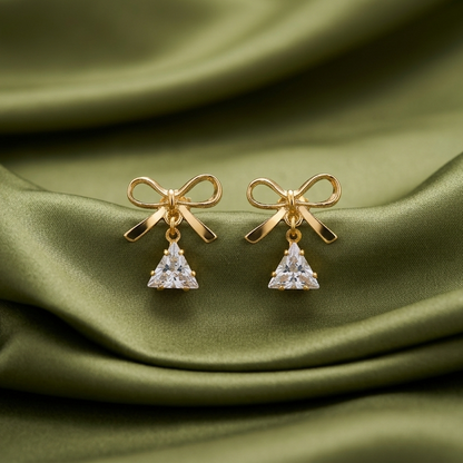 golden bow drop earings