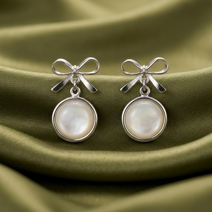 pearl bow drop earings