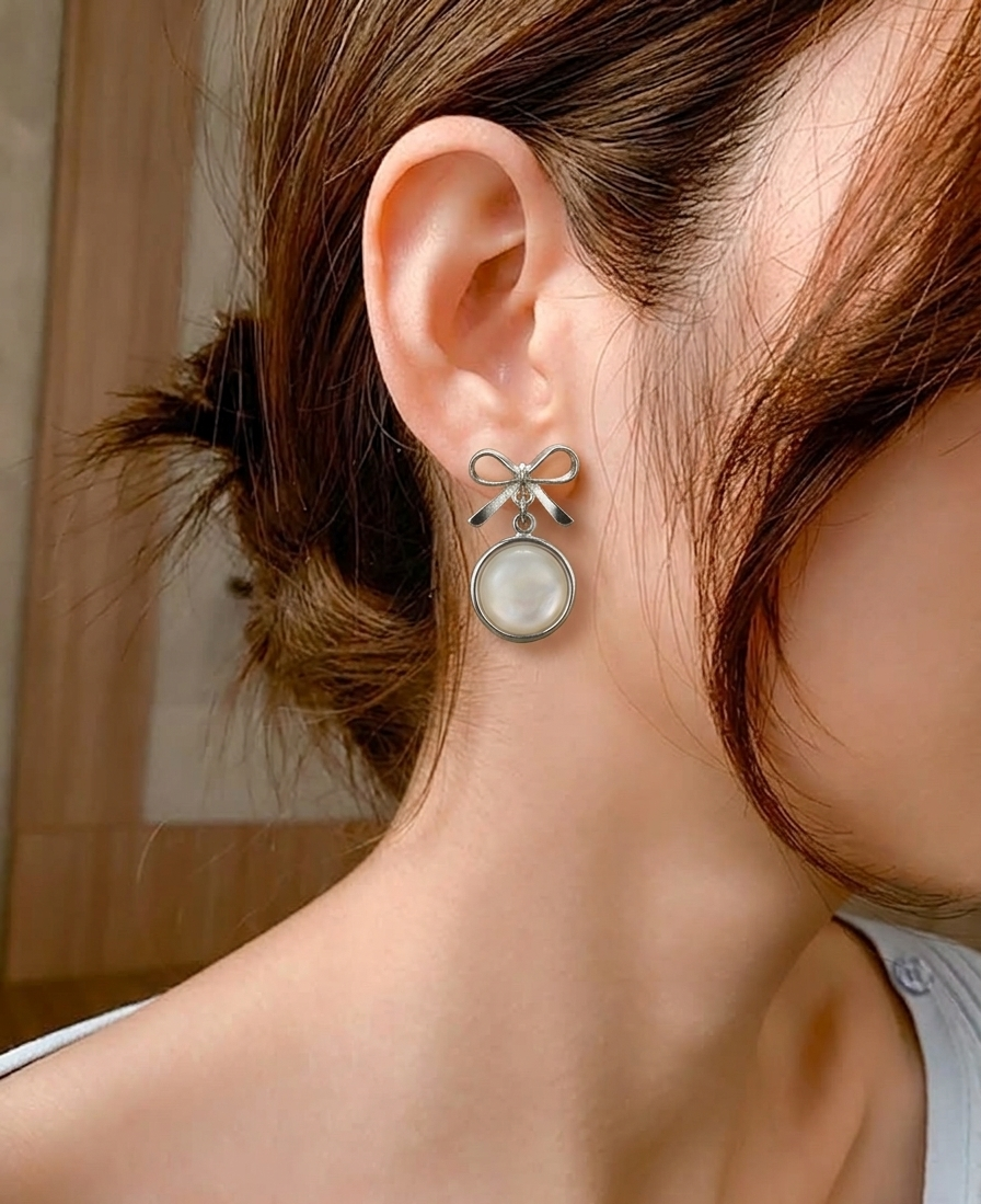 pearl bow drop earings
