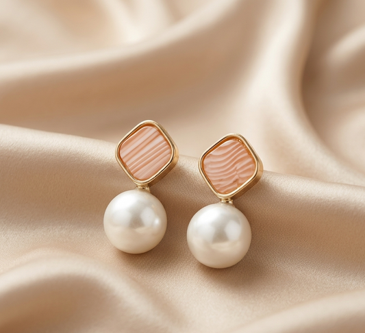 pink square with pearl