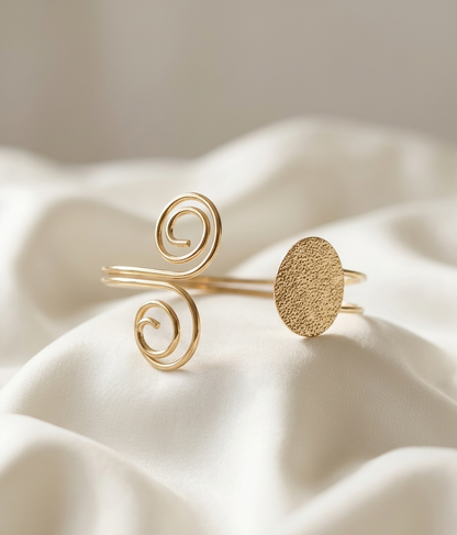 modern disc and coil cuff